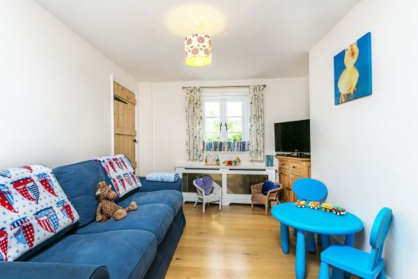 Play room just off the kitchen for our younger guests with toys, tv and DVD player